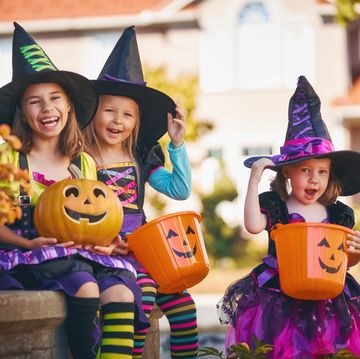 kids dressed as witches on halloween